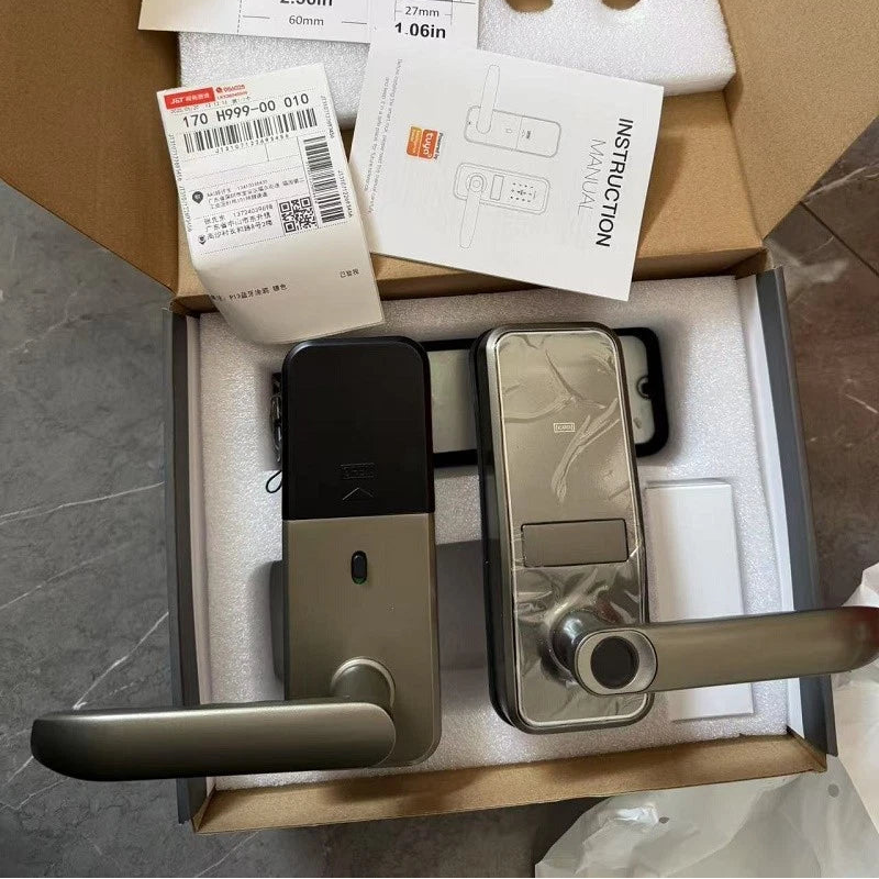Silver lever-handle smart door lock in its box with the fixings and instruction booklet